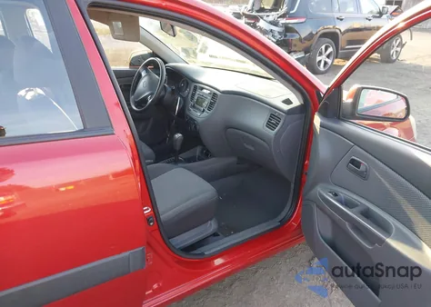 2009 Kia Rio Base z USA, uszkodzony, nr VIN KNADE223596500782